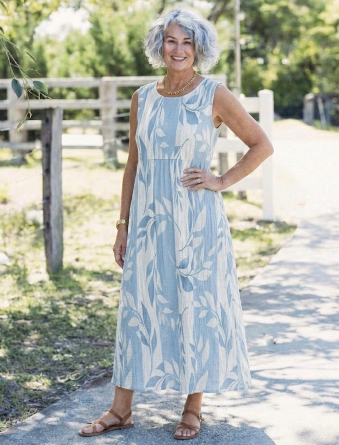 Solene | Ärmelloses Midi-Kleid mit blauem Blattmuster